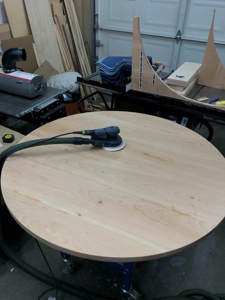 round cherry dining table before finish